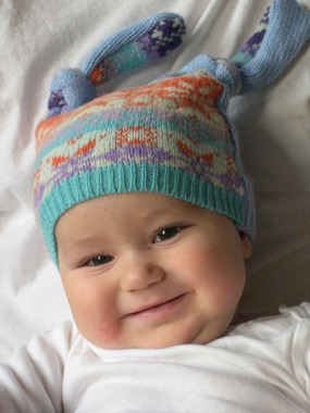 Winter hat, left, upcycled fabric; jersey hat, upcycled cotton fabric